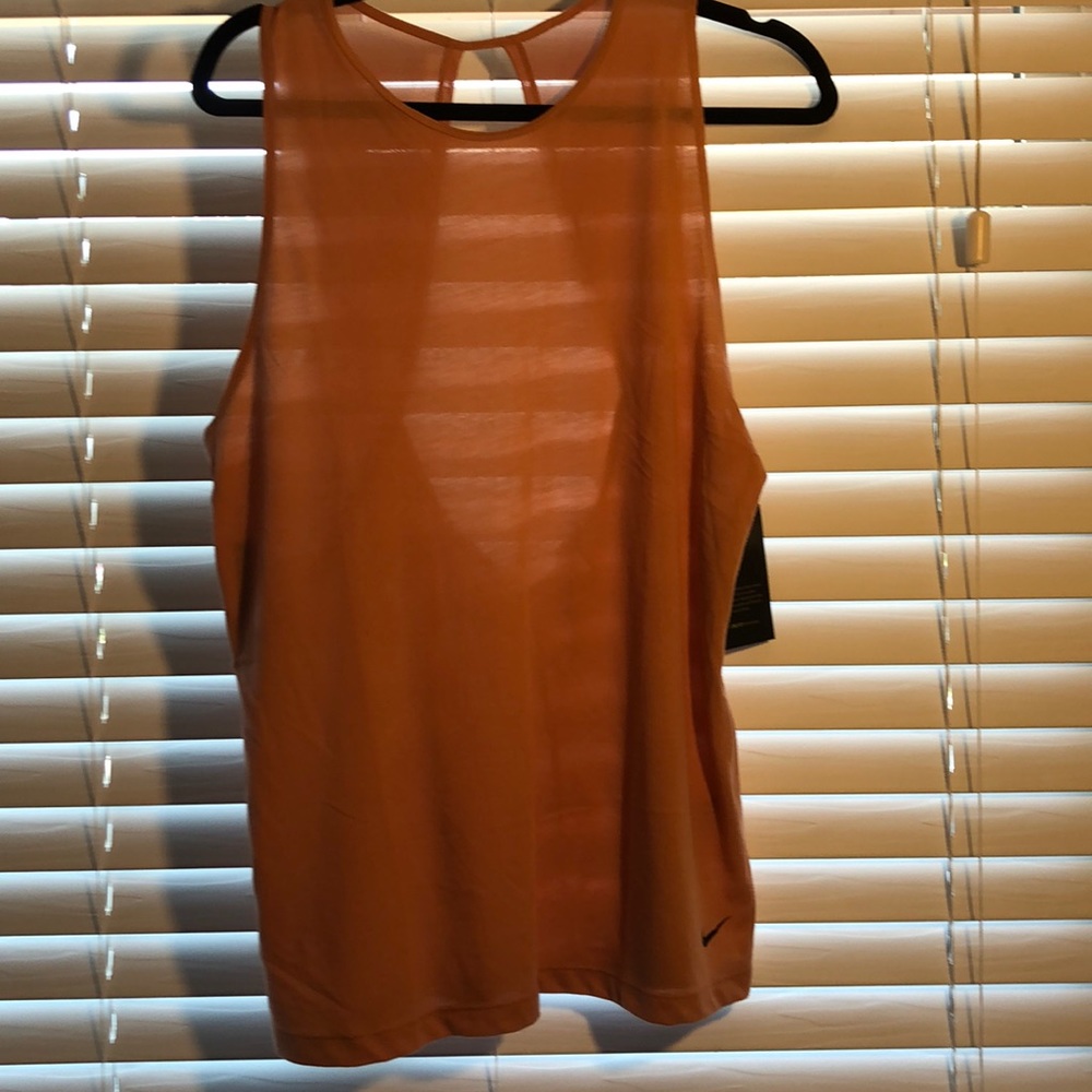 Brand new Nike Dri-Fit top, size L